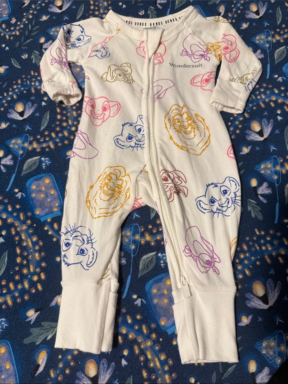 Disney Bonds Ivory Wondersuit Footed One-Piece with Multicolor Character Faces